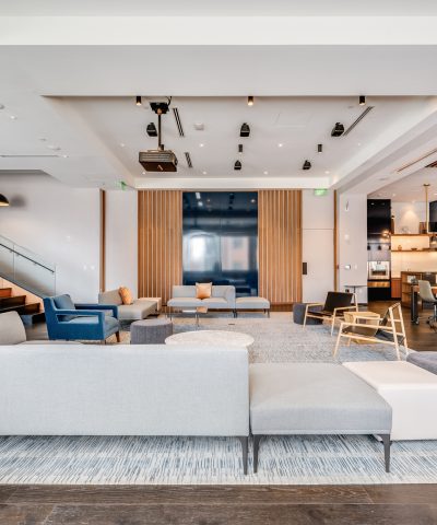 Presentation lounge at Echelon Innovation Center with the projection screen raised
