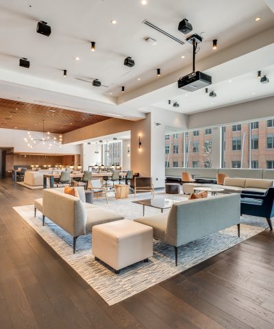 Lounge seating beside floor-to-ceiling windows at Echelon Innovation Center